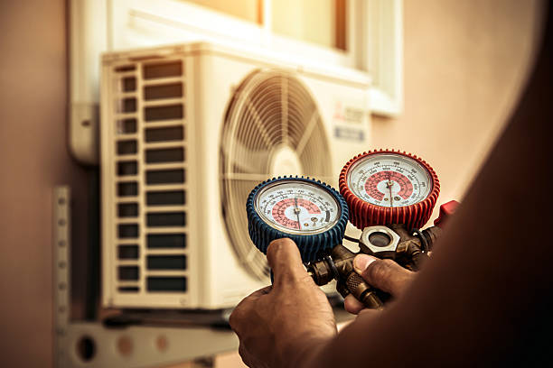 Professional Heat Pump Repair technician working in Columbus, IN